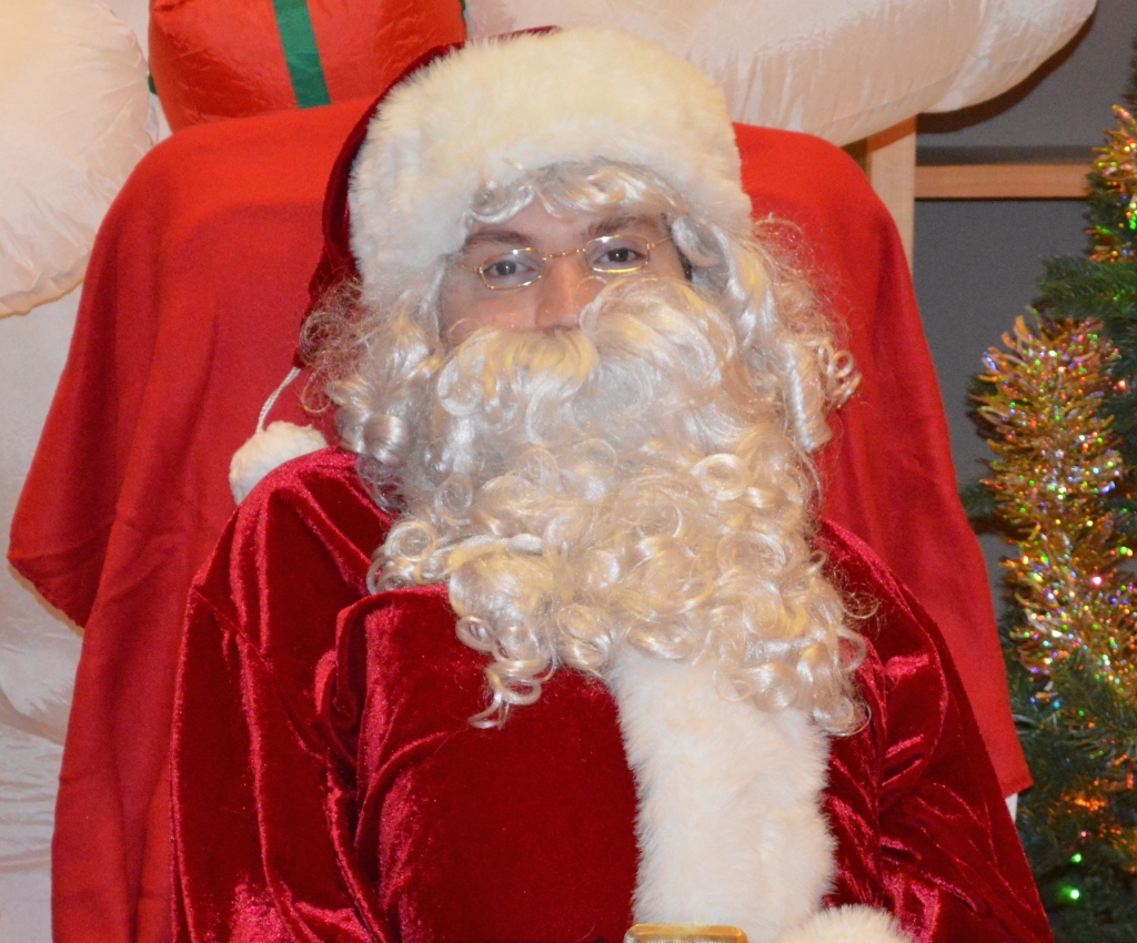 Santa with Autism Sits on Ground to Play with Boy with Autism - Kerry Magro