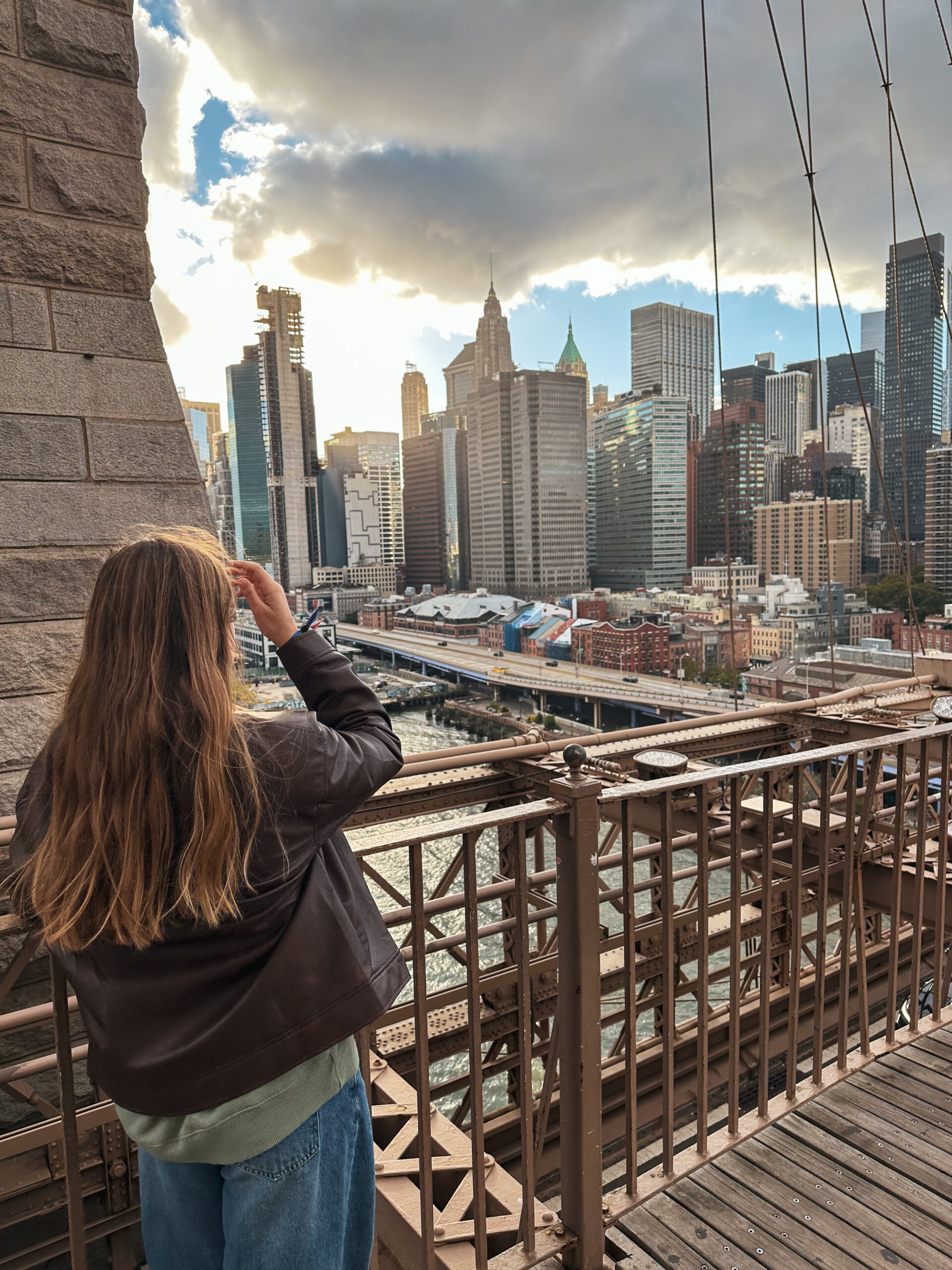 Hayden Anderton looking toward the New York City skyline