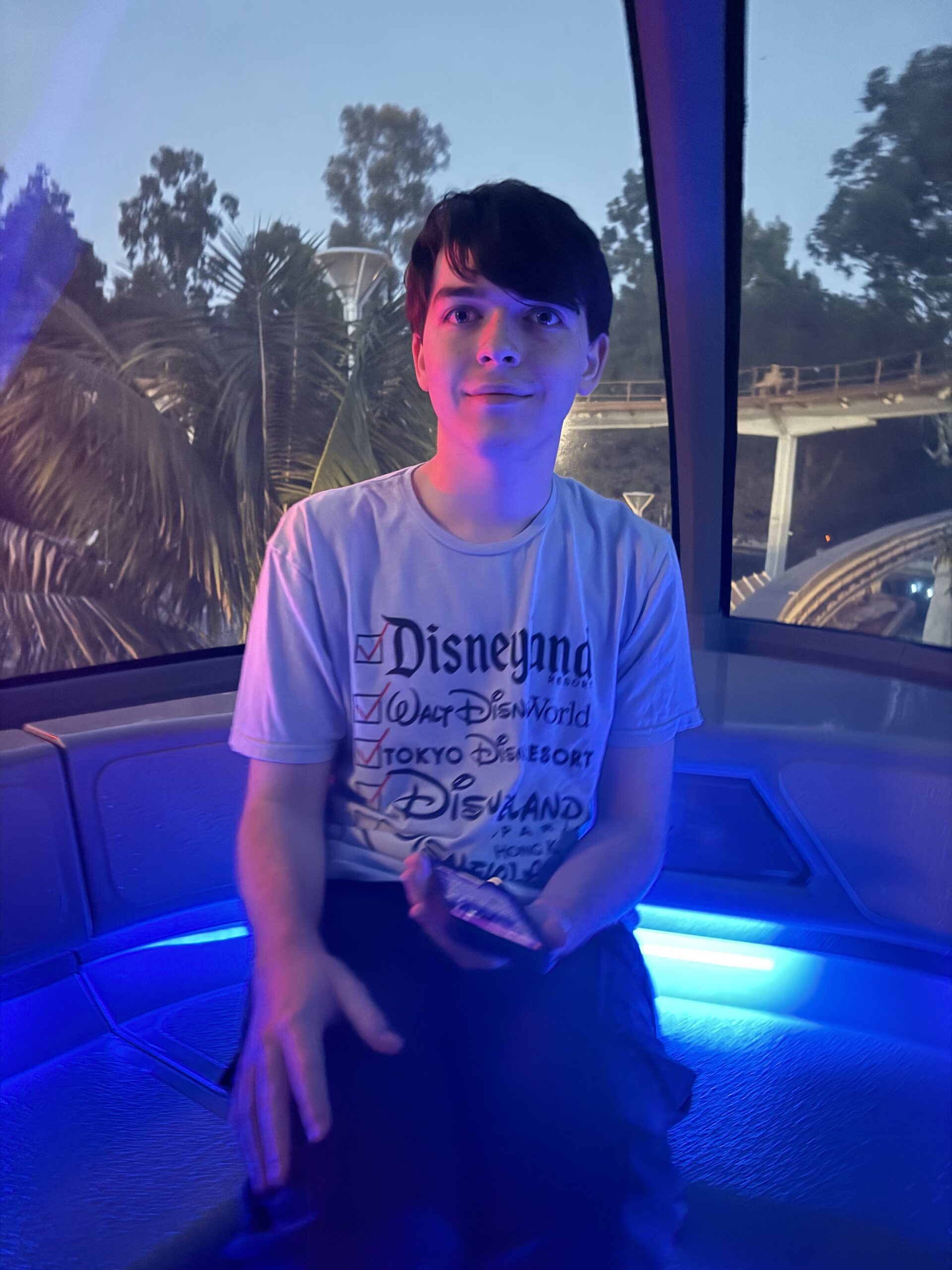 Hayden Morhar riding a monorail