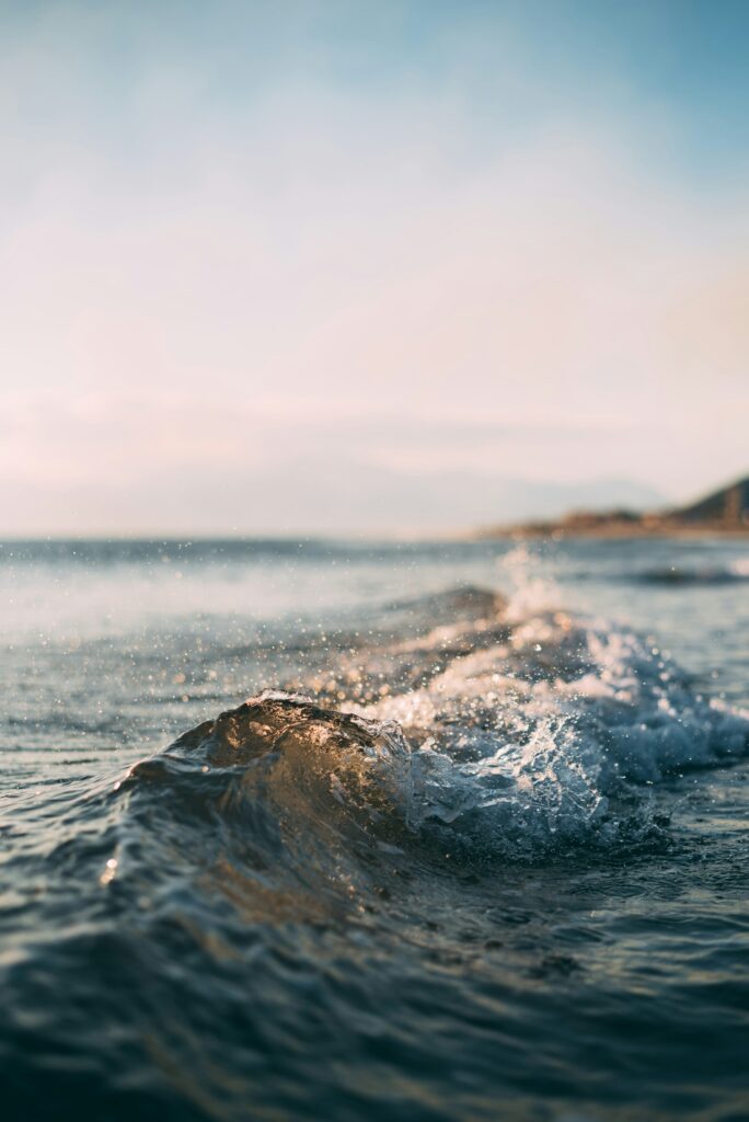 Ocean wave at a beach. Non-identifying stock photograph.